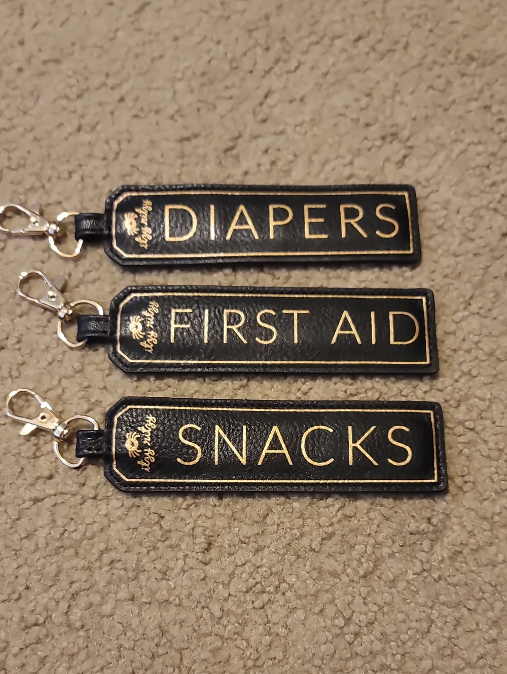 Itzy Ritzy Black and Gold 'Diapers/First Aid/Snacks' Organizer Key Tags